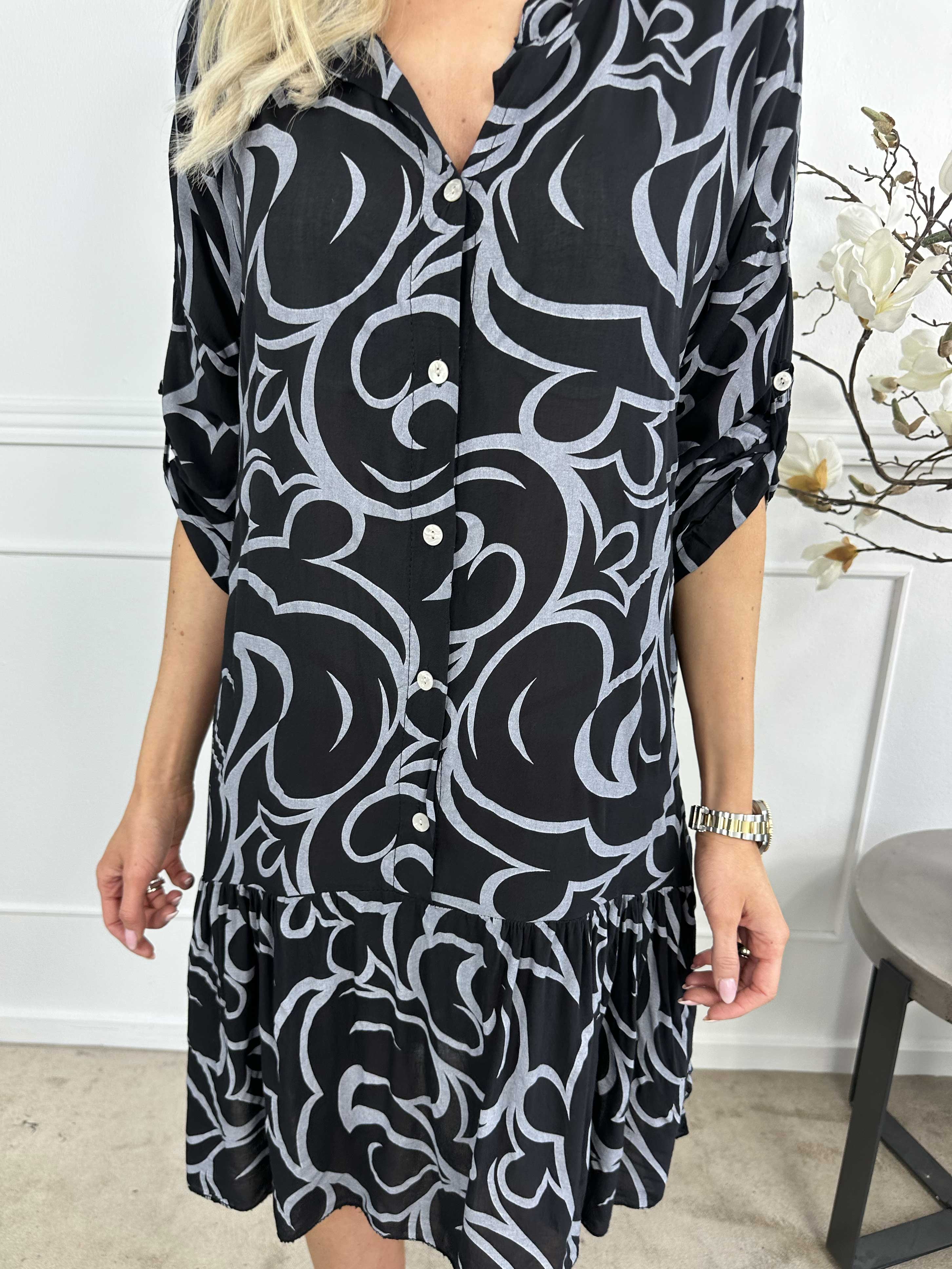 Linda - Mönstrad skjortklänning med volang i nederkant